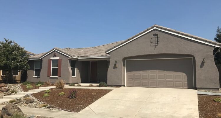 Exterior Painted Home and garage door
